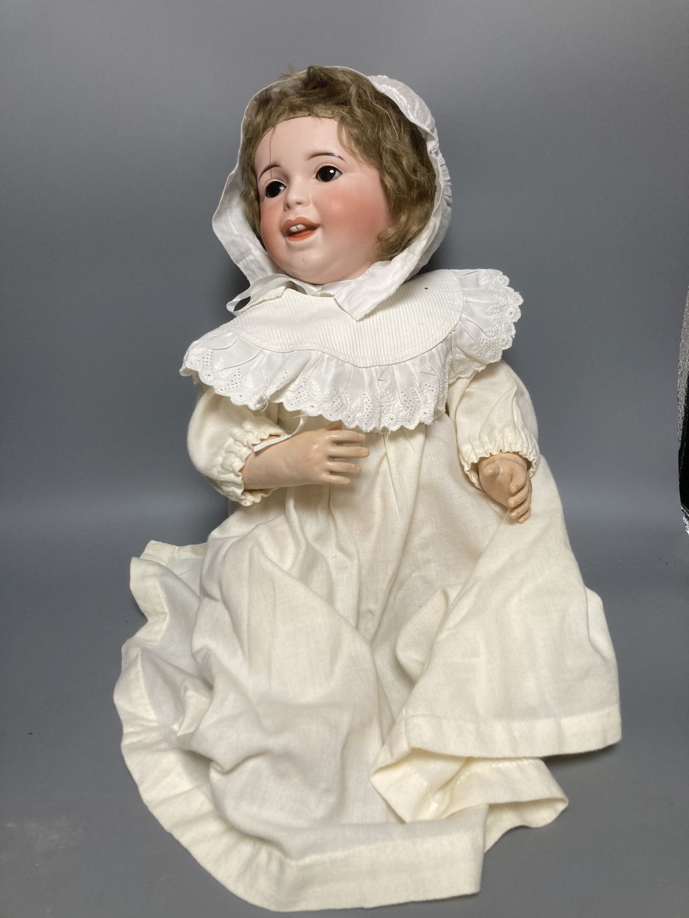 A French SFBJ bisque-headed doll, mould 236 with sleeping eyes and closed mouth, bent-limb composition body, 48cm